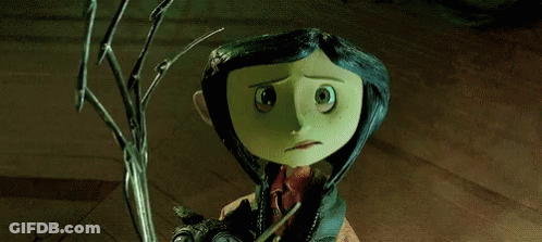 Coraline From Coraline The Animated Movie Is Holding A Cat GIF
