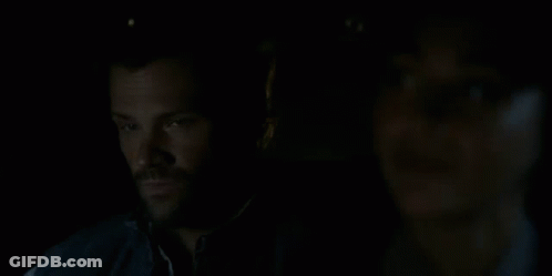 Cordell Walker Texas Ranger Is Talking To A Woman In A Dark Room . GIF