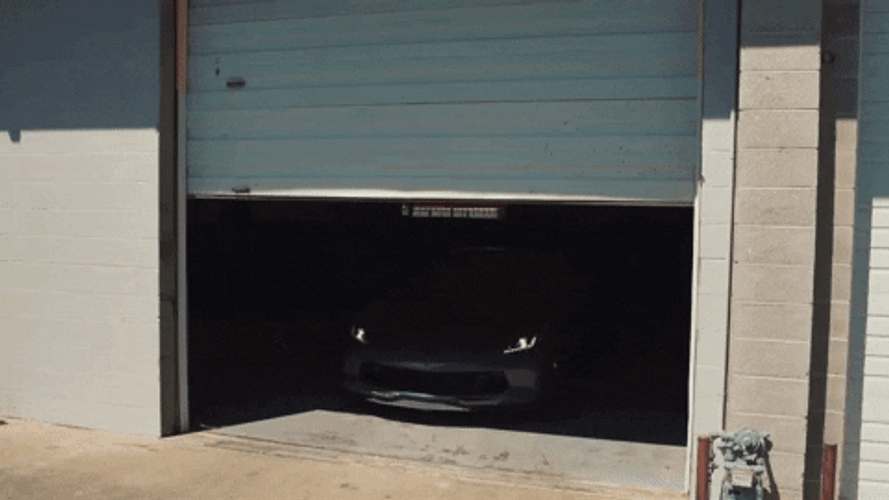Corvette Fast Car Coming Out Of The Garage GIF