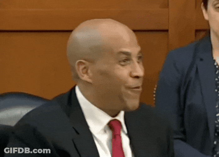 Cory Booker Watch Me Shoulder Brush GIF