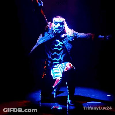 Costumed Man With Flaming Arms And Tiffanyluv24 GIF