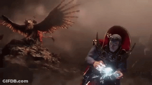 Costumed Person Before Full Moon GIF