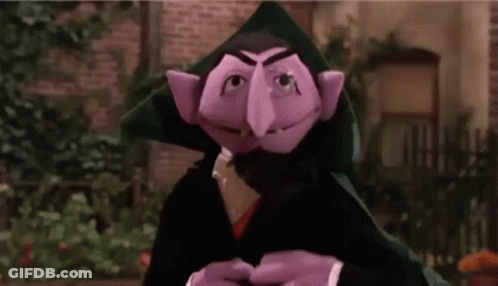 Count Von Count Holding Ice Cream Cone And Cape GIF