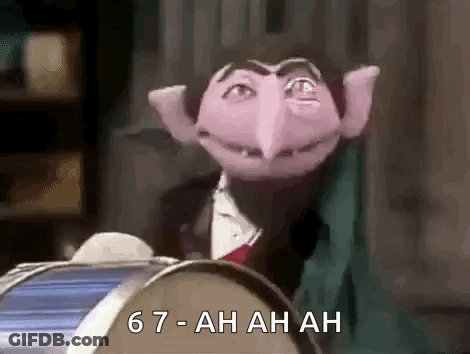 Count Von Count Sitting In Front Of Drum GIF