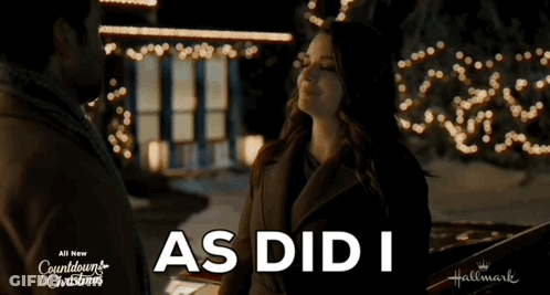Countdown To Christmas Man And Woman Looking At Each Other GIF