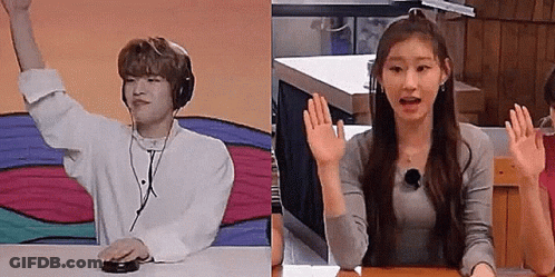 Couple At Table, Hands Up, Man With Headphones GIF