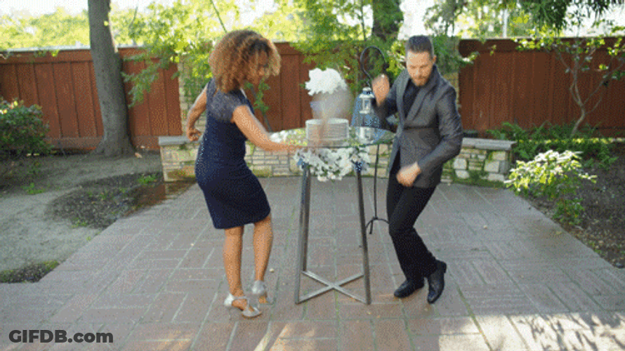 Couple Celebrating Breaking Dish Mazel Tov GIF