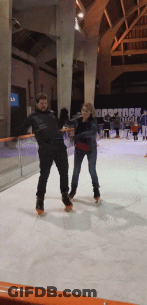 Couple Chaotic Ice Skating GIF