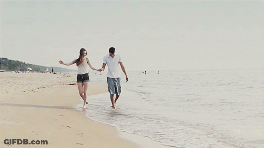 Couple Hold Hands Beach GIF
