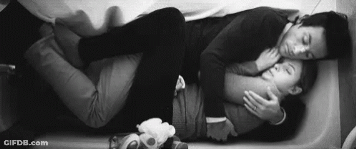 Couple Hold In The Sofa GIF