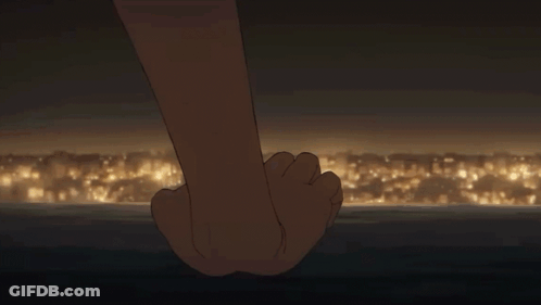 Couple Holding Hands Gazing In Dark Room GIF
