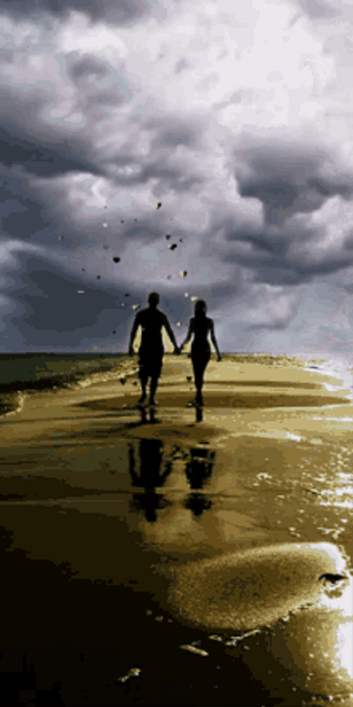 Couple Holding Hands Under Cloudy Sky GIF