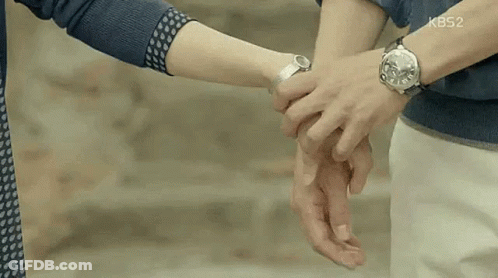 Couple Holding Hands Woman Wearing Watch GIF
