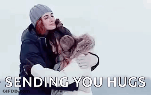 Couple Hugging In The Snow Sending You Hugs GIF