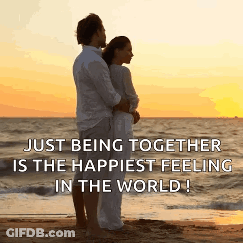 Couple Hugging On Beach Saying Just Being Together GIF