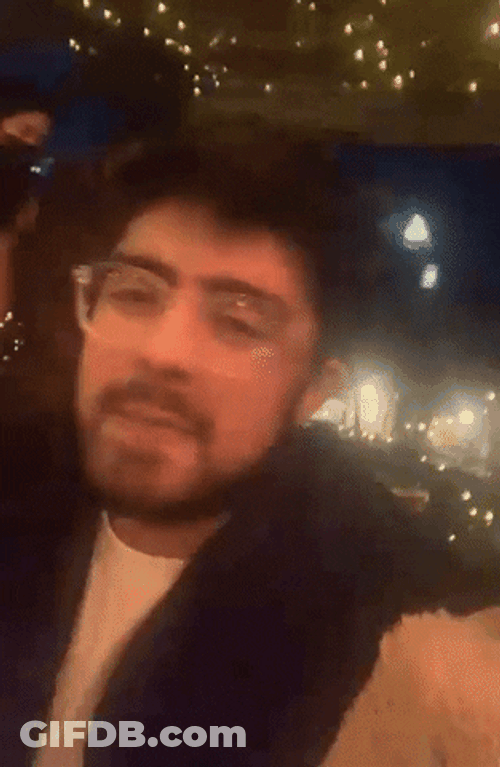 Couple In A Date Wave And Smile GIF