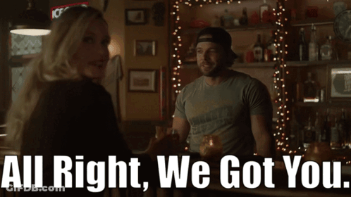 Couple In Bar Saying All Right We Got You GIF