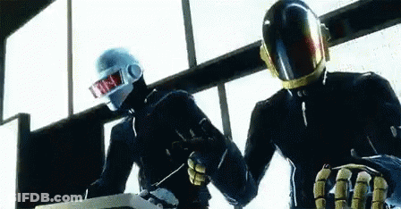 Couple In Helmets Shaking Hands GIF