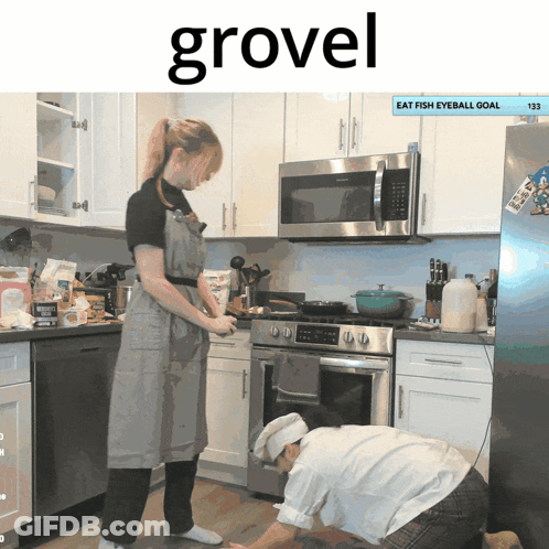 Couple In Kitchen Saying Grovel GIF