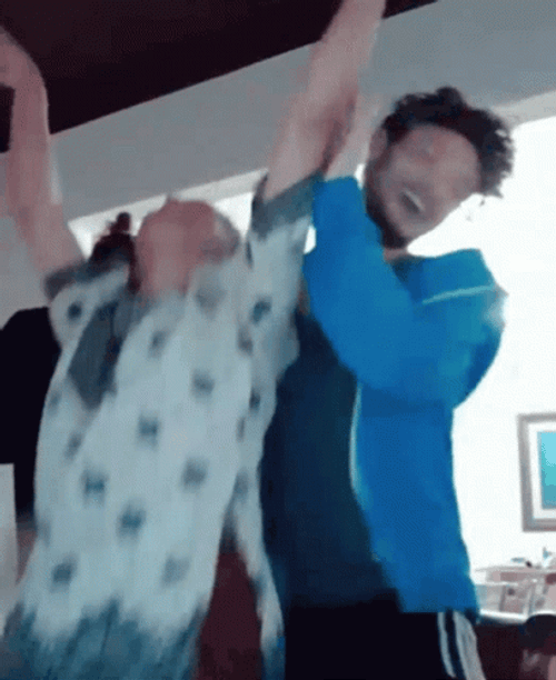 Couple Jumping Up And Down GIF