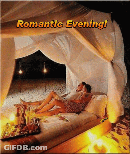 Couple Laying Under Canopy Saying Romantic Evening GIF