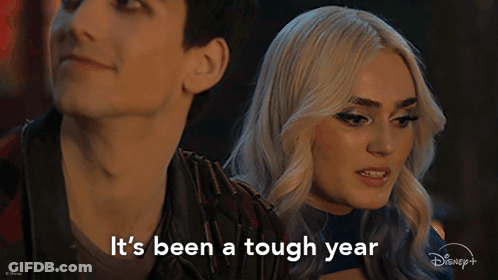 Couple Looking At Each Other Saying It's Been A Tough Year GIF