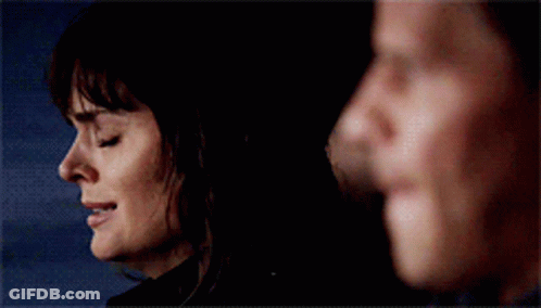 Couple Looking, Woman Crying GIF