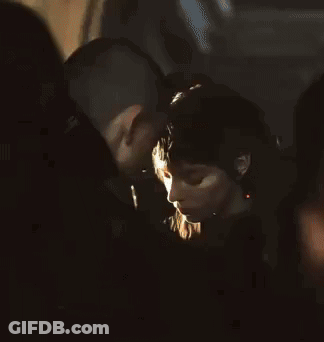Couple Of Aliens Holding Hands In Field GIF