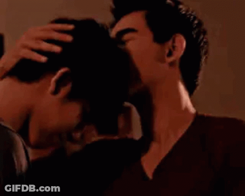 Couple Of Men Kissing On Forehead GIF