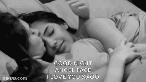 Couple Of Women Kissing On Bed GIF