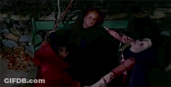 Couple Of Women Sitting On Bench At Night GIF