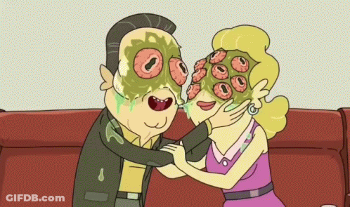 Couple On Couch Woman With Mask GIF