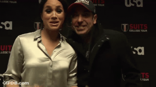 Couple Posing Suits College Tour Wall GIF