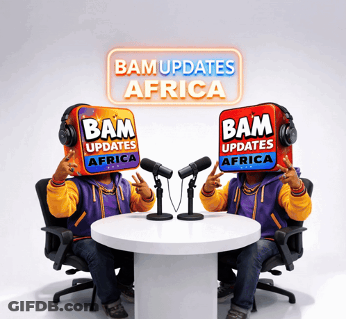Couple Sitting At Table With Bam Updates Africa Sign GIF