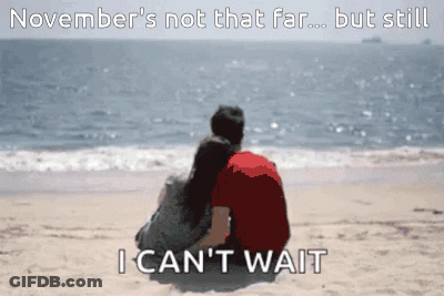 Couple Sitting On Beach Waiting GIF