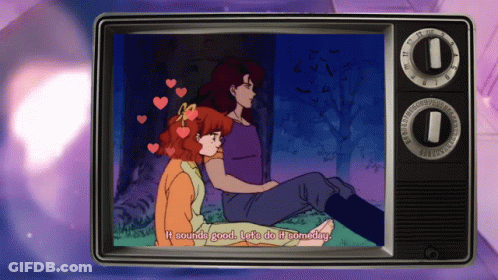 Couple Sitting Under Tree Saying Let's Do It Again GIF