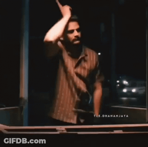 Couple Standing Next To Each Other In Room GIF