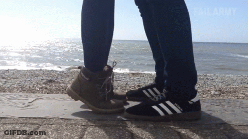 Couple Standing Next To Each Other Saying Failarmy GIF