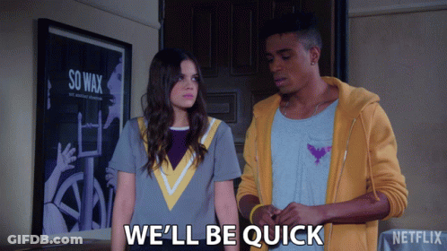 Couple Standing Next To Each Other Well Be Quick GIF
