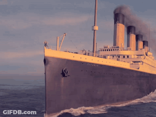 Couple Standing On Deck Of Titanic GIF