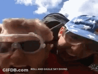 Couple Standing Roll And Giggle Sky Diving GIF