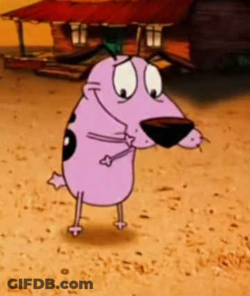 Courage The Cowardly Dog Is Standing In The Dirt In Front Of A Building . GIF
