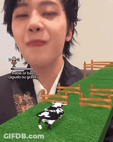 Cow With Horns On Yellow Background Saying What's That GIF
