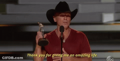 Cowboy Hat Man Holding Trophy Saying Thank You GIF