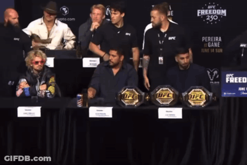Cowboy Hat Man In Front Of UFC Fighter GIF