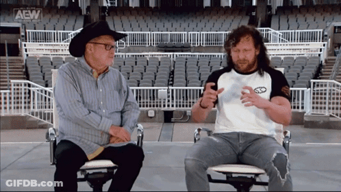 Cowboy Hat Man Next To Man With AEW Logo GIF