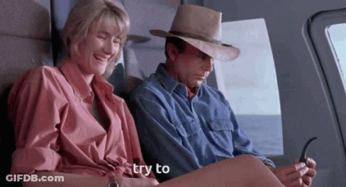Cowboy Hat Man Next To Pink Shirt Woman Try To GIF