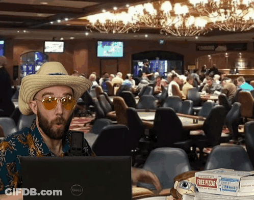 Cowboy Hat Man On Dell Laptop At Casino GIF