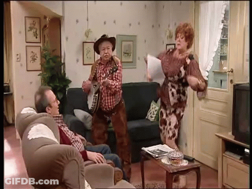 Cowboy Hat Man Playing Guitar With Two People GIF