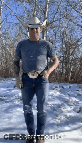 Cowboy Hat Man Says Darn Tooting In Snow GIF